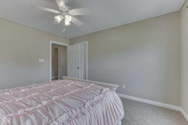 bedroom featuring ceiling fan and carpet flooring