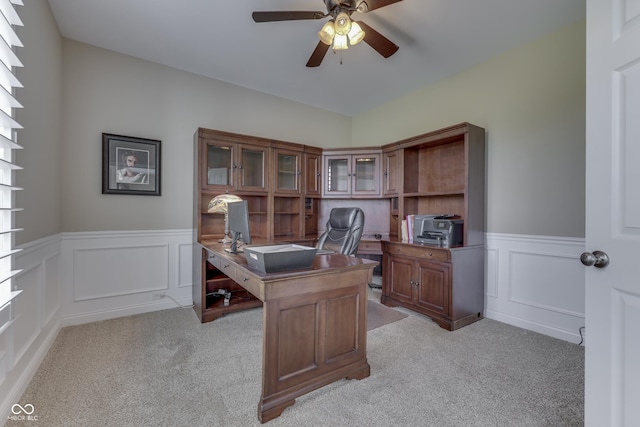 office with ceiling fan and light colored carpet