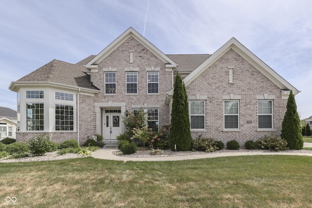 view of front of house with a front lawn