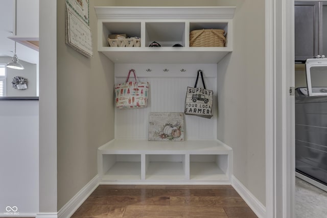 mudroom with washer / dryer and hardwood / wood-style flooring