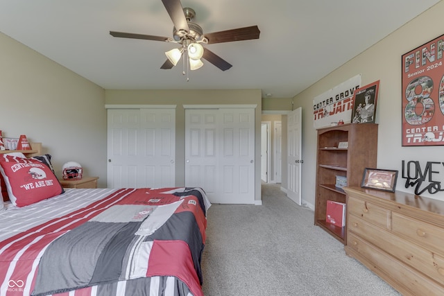 bedroom featuring ceiling fan and carpet