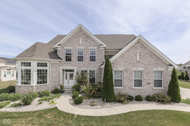 view of front of house featuring a front lawn