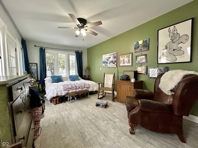 bedroom with ceiling fan and light hardwood / wood-style floors