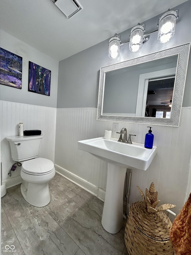 bathroom featuring sink and toilet