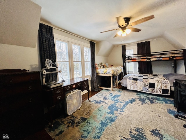 bedroom featuring ceiling fan and vaulted ceiling