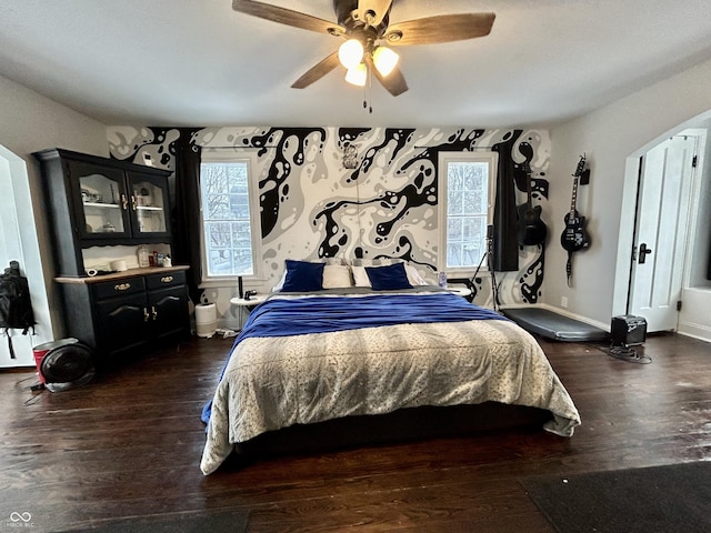 bedroom featuring dark hardwood / wood-style floors and ceiling fan