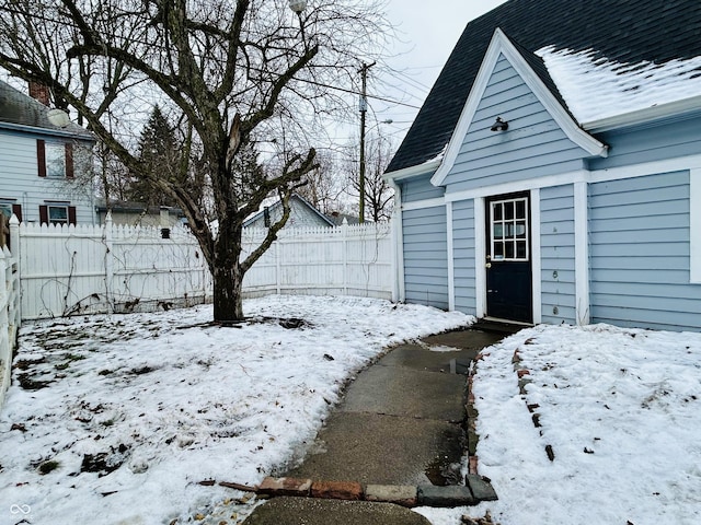 view of yard covered in snow