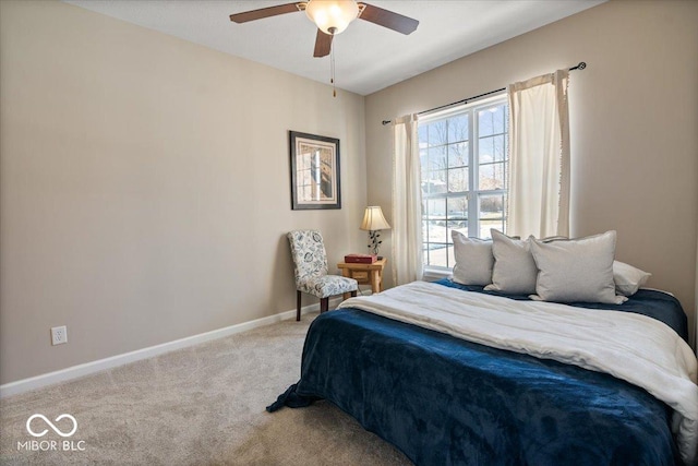 bedroom featuring ceiling fan and light colored carpet