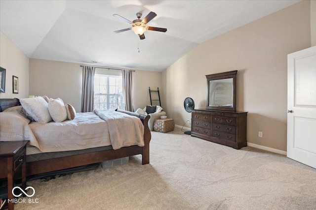 carpeted bedroom with lofted ceiling and ceiling fan