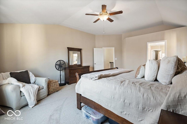 carpeted bedroom with ceiling fan and lofted ceiling