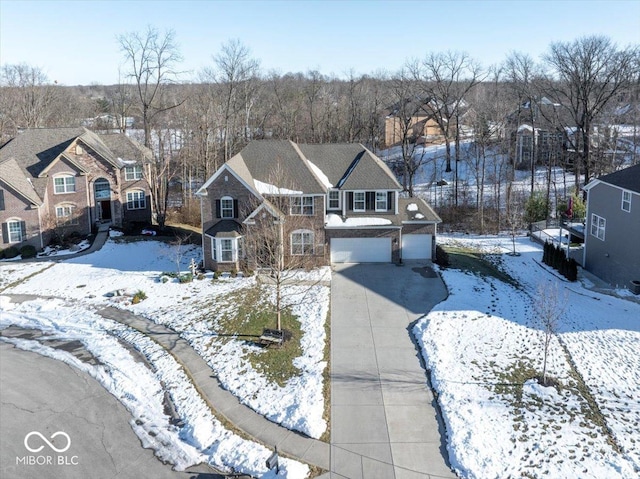 front of property with a garage