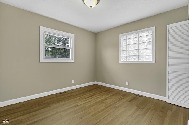 empty room featuring light hardwood / wood-style floors