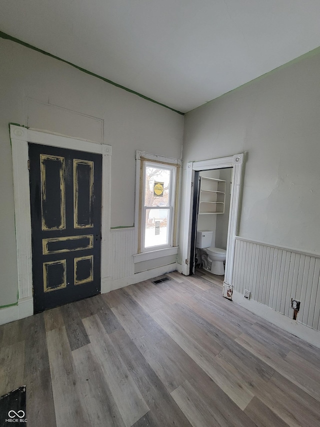 foyer entrance featuring light wood-type flooring