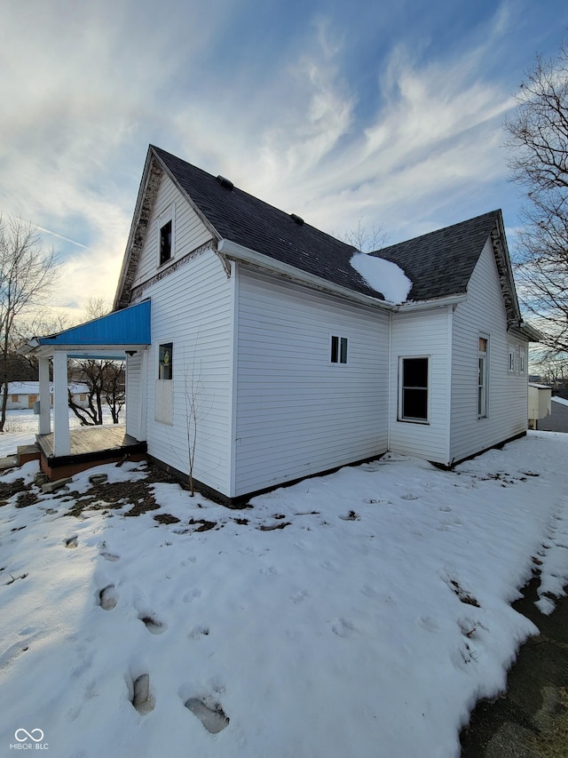 view of snow covered property