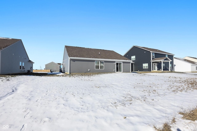 view of snow covered house