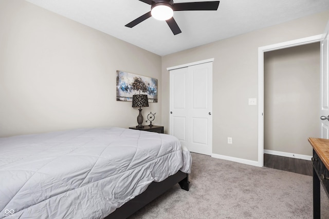 bedroom featuring ceiling fan, light carpet, and a closet