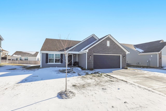 ranch-style home with a garage