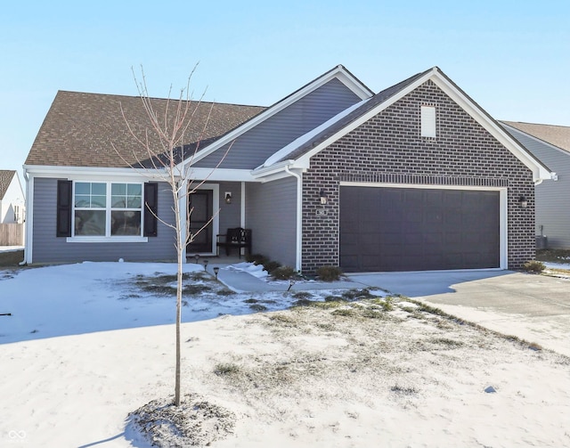 single story home featuring a garage