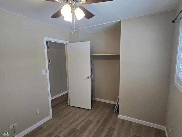 unfurnished bedroom featuring ceiling fan and wood-type flooring