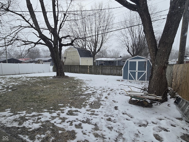 view of yard layered in snow