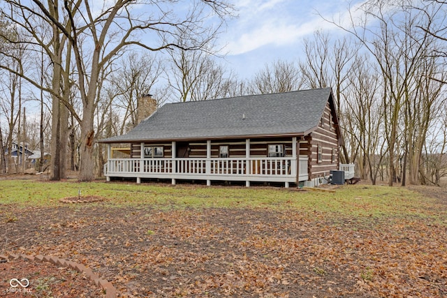 view of front of house featuring central AC unit and covered porch