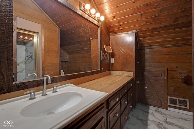 bathroom with wood walls, lofted ceiling, vanity, wood ceiling, and walk in shower