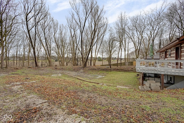 view of yard with a deck