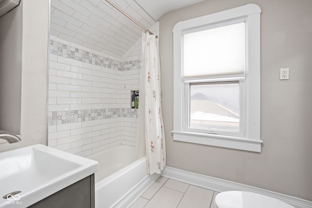 bathroom featuring shower / tub combo, baseboards, toilet, lofted ceiling, and vanity