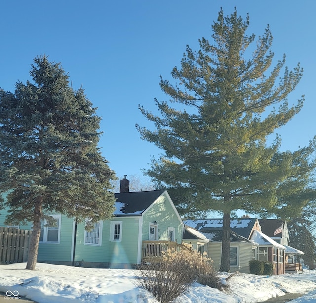 view of snow covered property