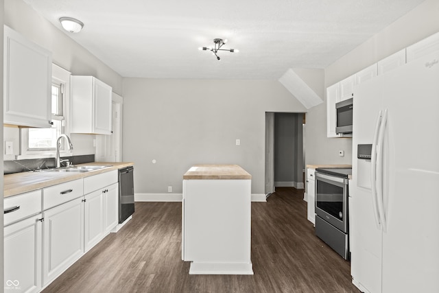 kitchen featuring sink, white cabinetry, wooden counters, dark hardwood / wood-style flooring, and stainless steel appliances