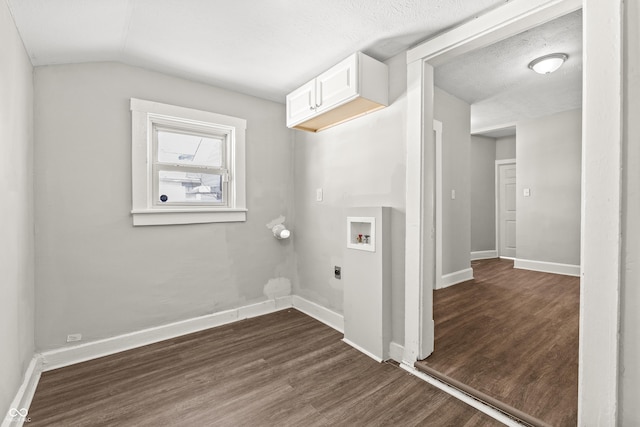 laundry room featuring dark hardwood / wood-style floors, washer hookup, hookup for an electric dryer, and a textured ceiling