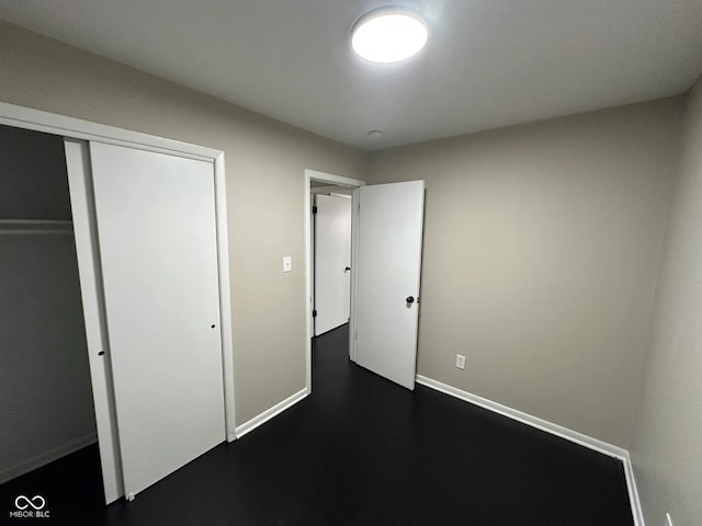 unfurnished bedroom featuring a closet