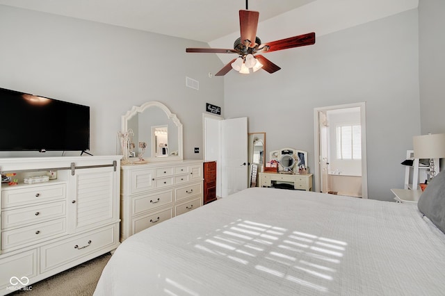 bedroom with ceiling fan, high vaulted ceiling, and light carpet