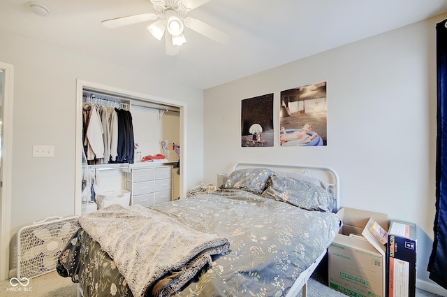 bedroom with ceiling fan, a closet, and carpet flooring