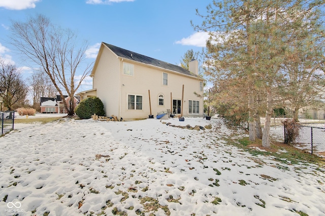 view of snow covered property