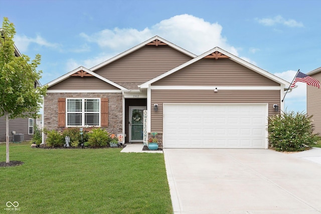 view of front facade with a front yard, a garage, and cooling unit