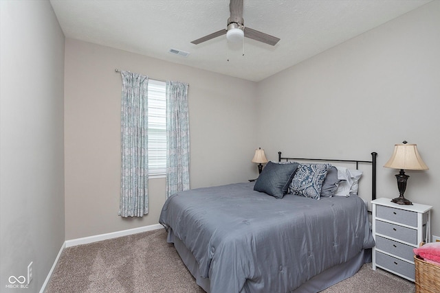 bedroom featuring ceiling fan and carpet floors