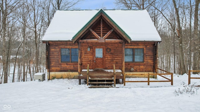 view of log cabin