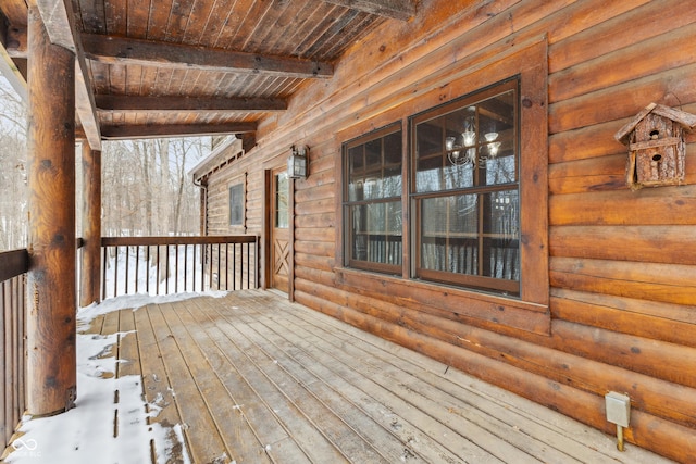 view of snow covered deck