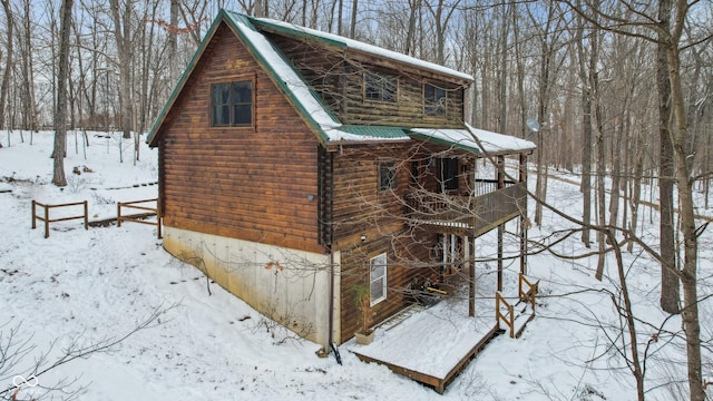 view of snow covered property