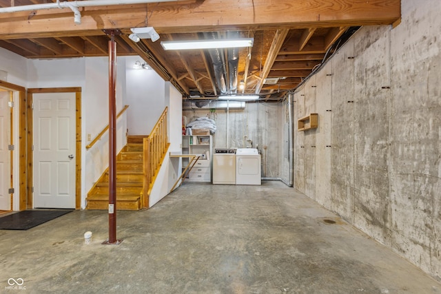 basement featuring washing machine and dryer