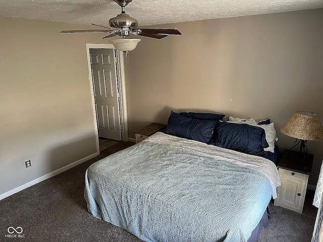 carpeted bedroom featuring ceiling fan and a textured ceiling