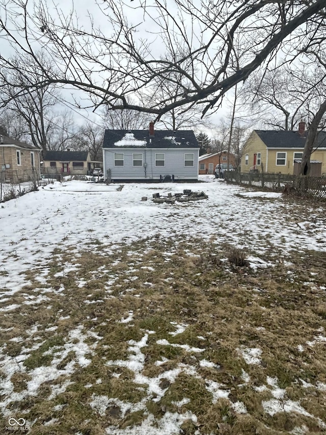 view of yard covered in snow