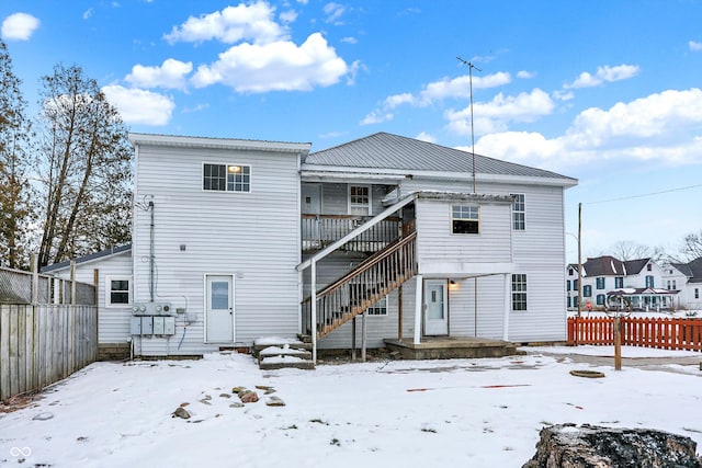 view of snow covered property