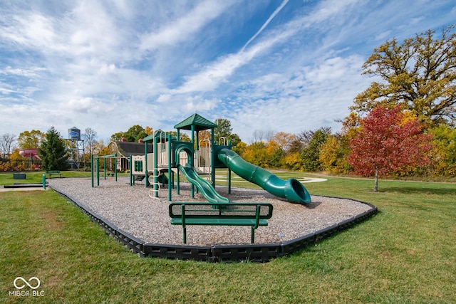 communal playground featuring a yard