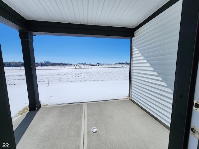 view of snow covered patio