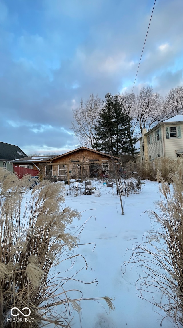 view of yard covered in snow