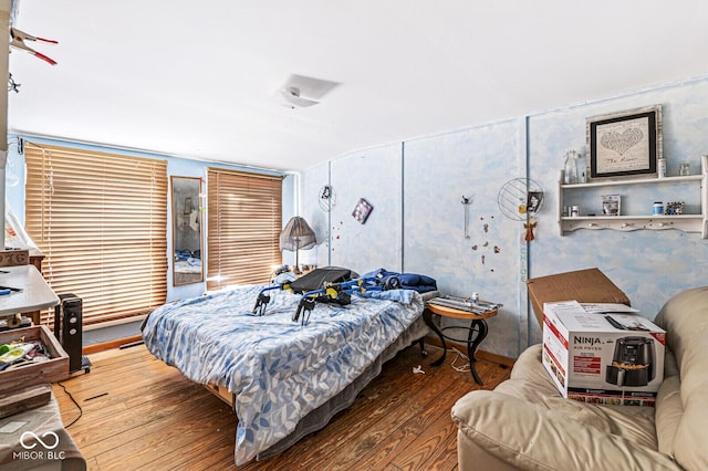 bedroom featuring wood-type flooring