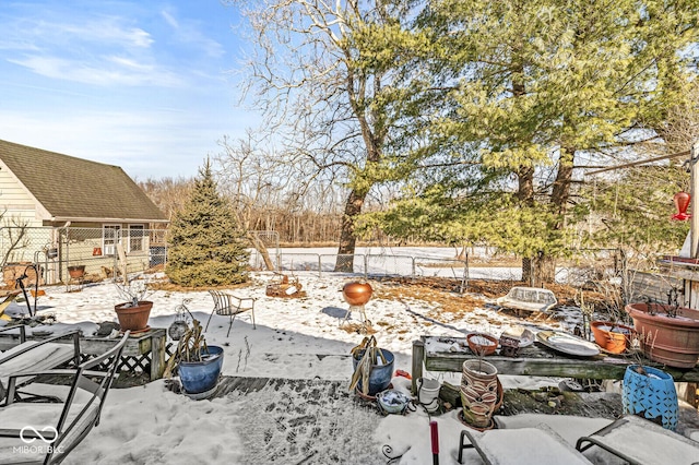 view of snow covered patio