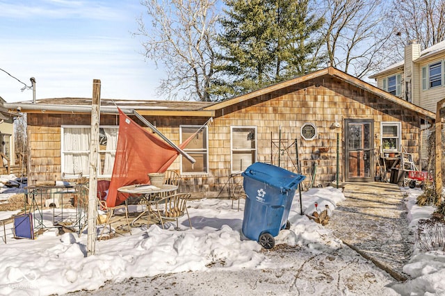 view of snow covered property